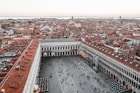 people walking by the buildings