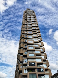 brown concrete high-rise building during daytime