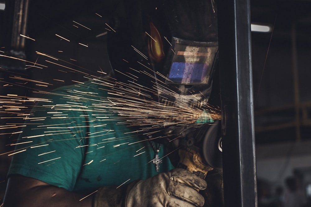 a welder working on a piece of metal