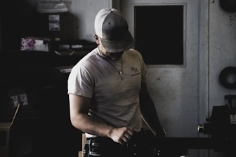 standing man near door