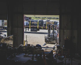 black forklift outside factory