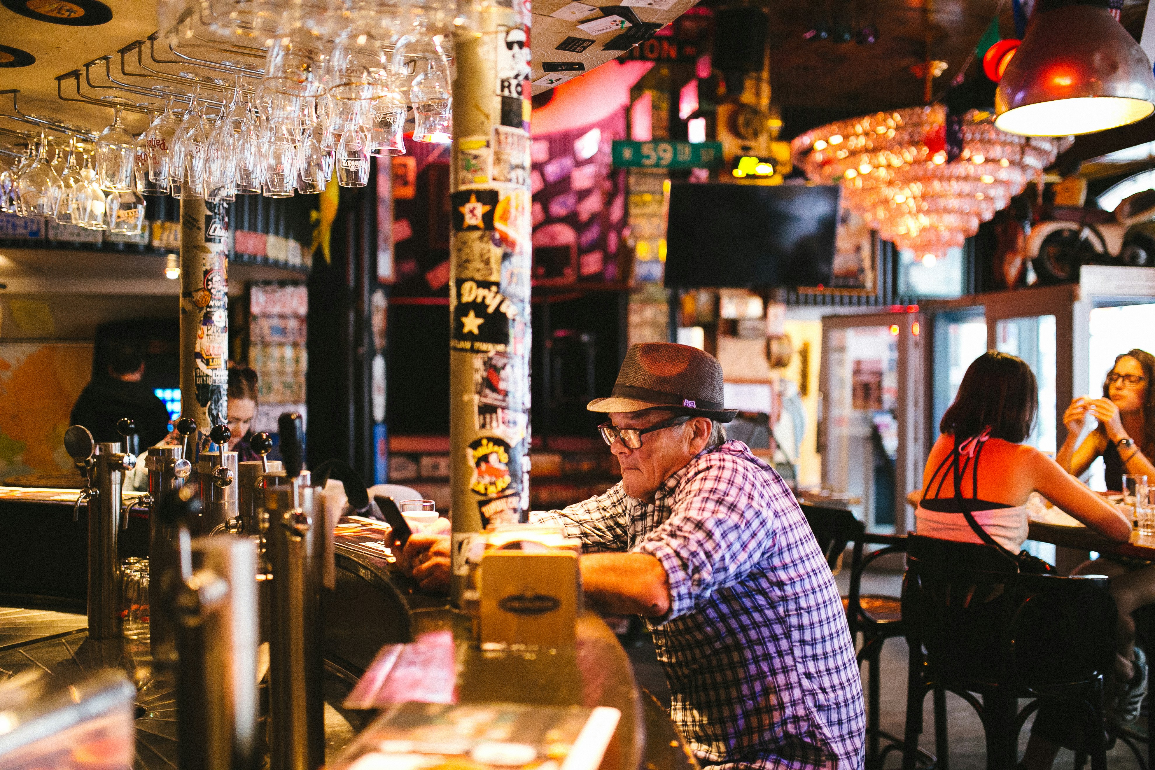 man sitting on bar area