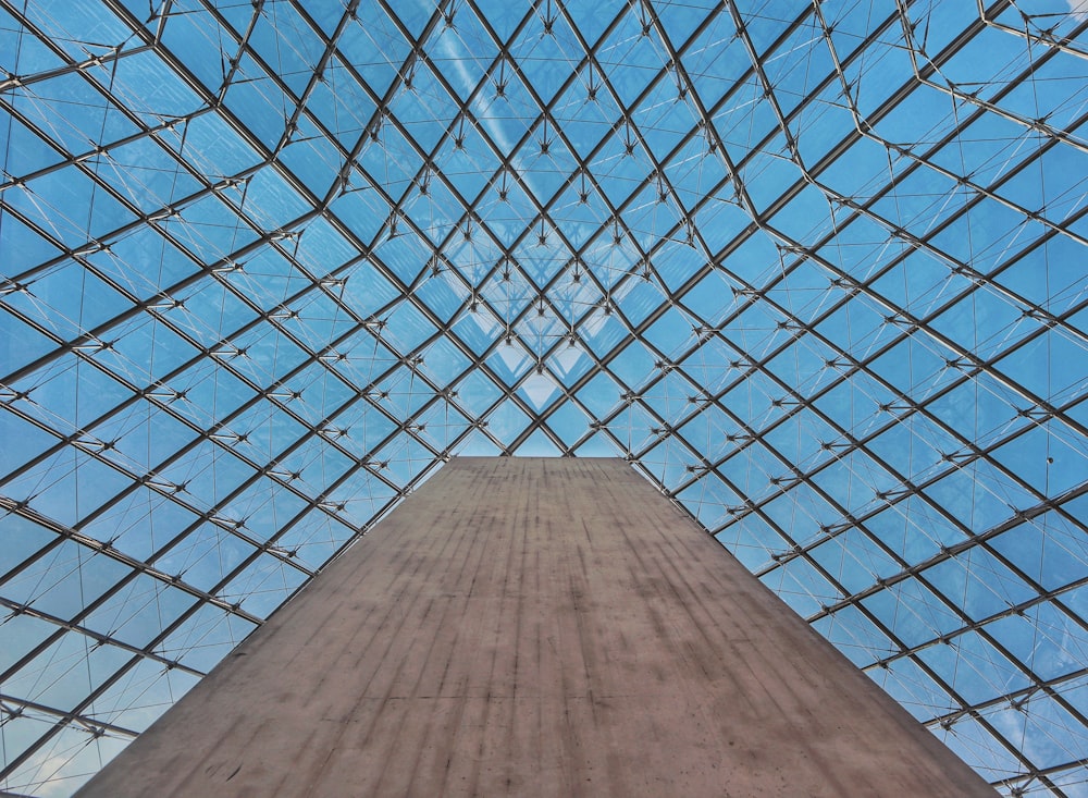 a very tall building with a lot of glass on top of it