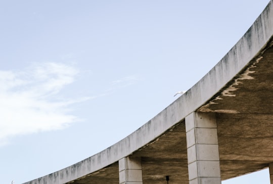 curved white flyover in Anella Olímpica Spain