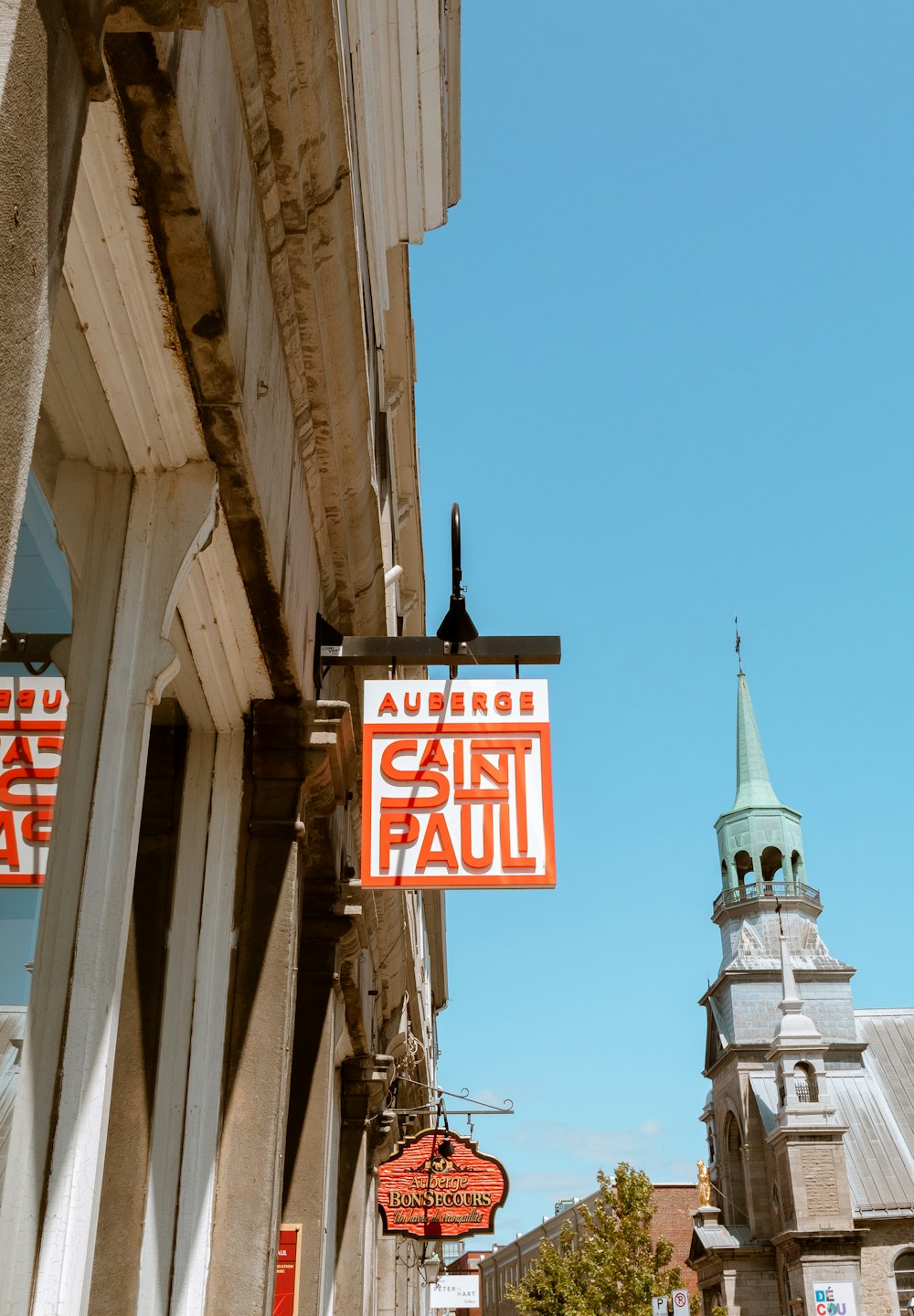 Aureros Saint Paul signage hanging outside a building