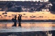 men walking on shore