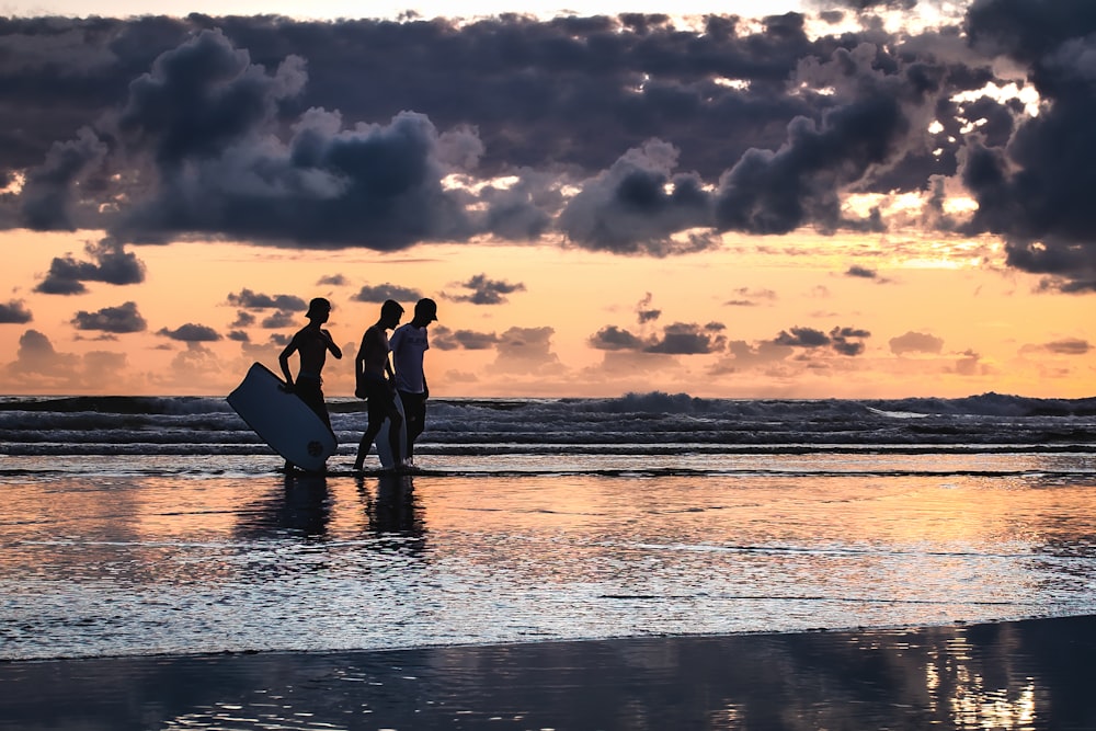 men walking on shore