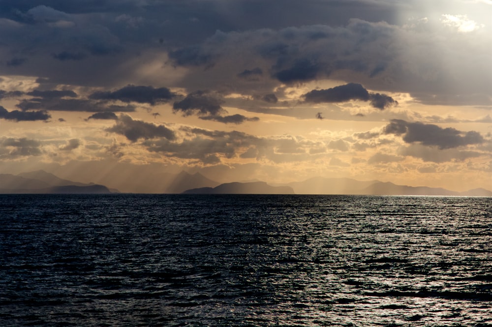 cal sea under cloudy sky