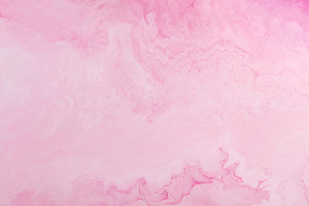 un fondo rosa y púrpura con un borde blanco