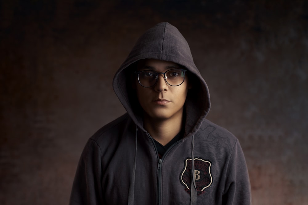 Person wearing eyeglasses and gray zip-up hoodie photo – Free Hood Image on  Unsplash