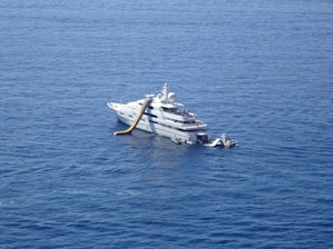 yacht with inflatable slide at the ocean