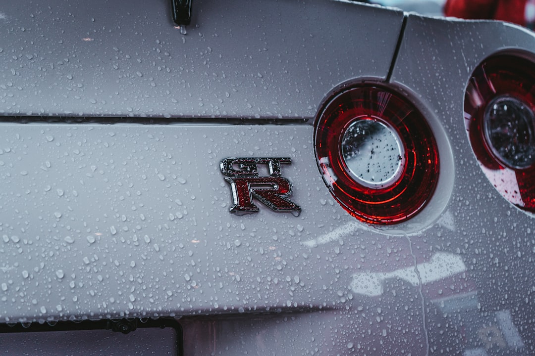 wet white Nissan GTR car