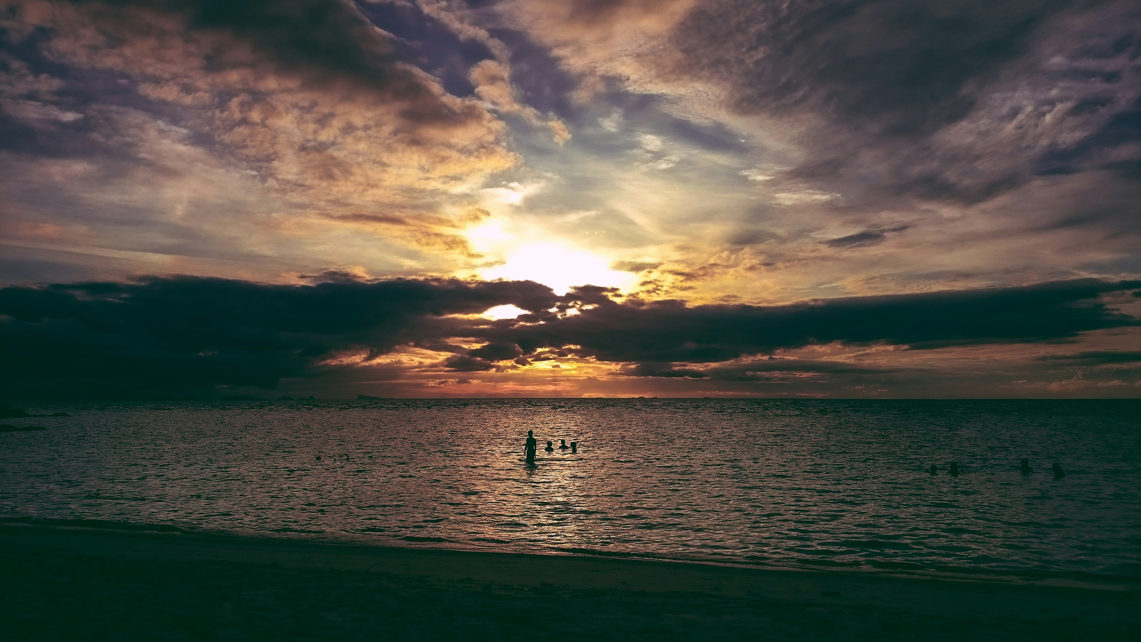 silhouette of person on water