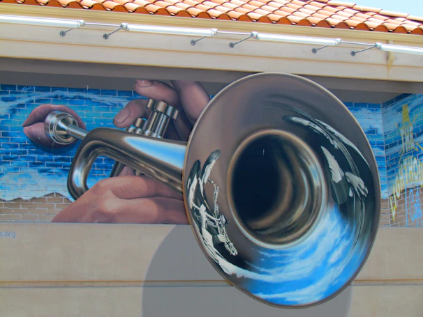 Washington Trumpet Guild logo displayed prominently on a concert banner at a local venue.