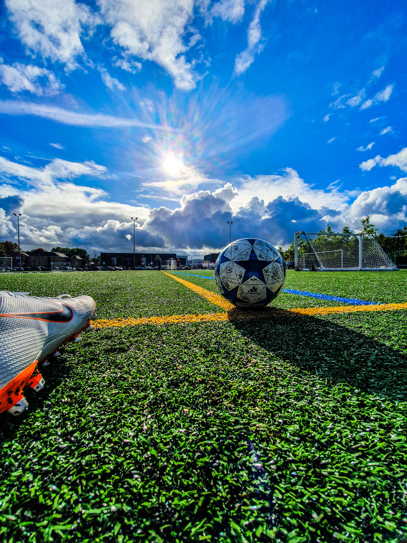 Football match viewed from the touchline