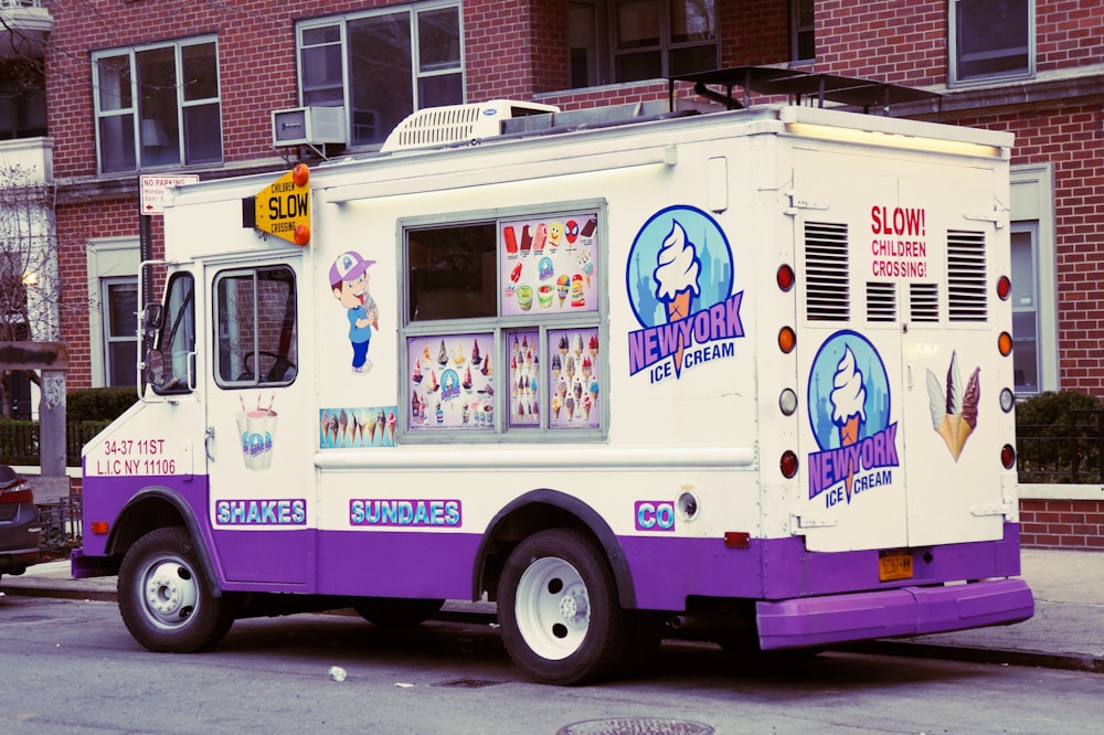 white and purple enclose van