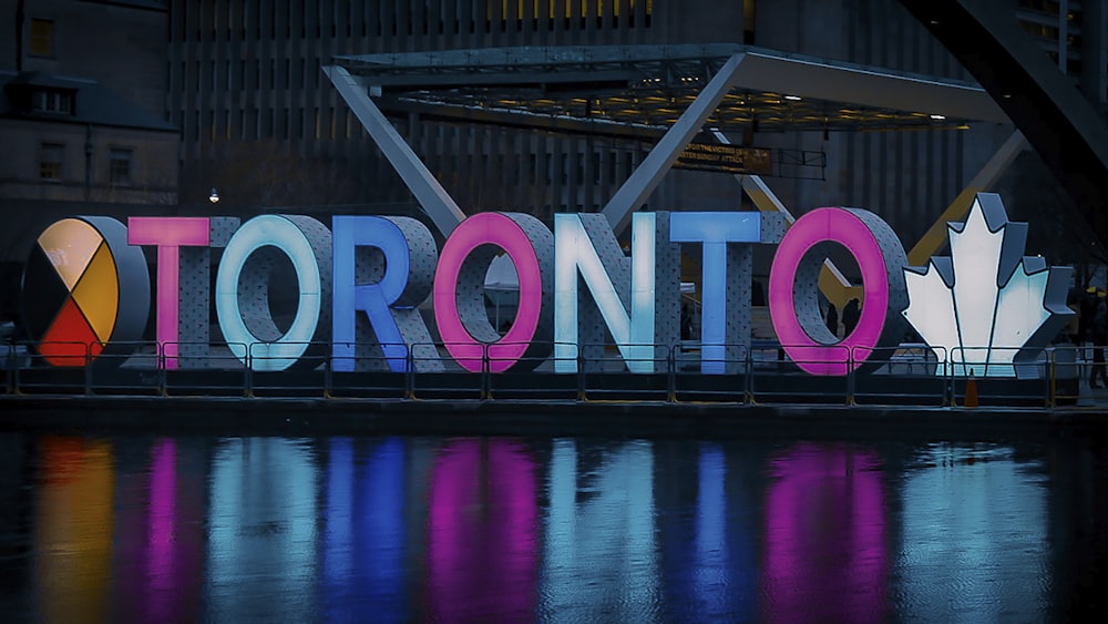 Toronto signage during nighttime photo