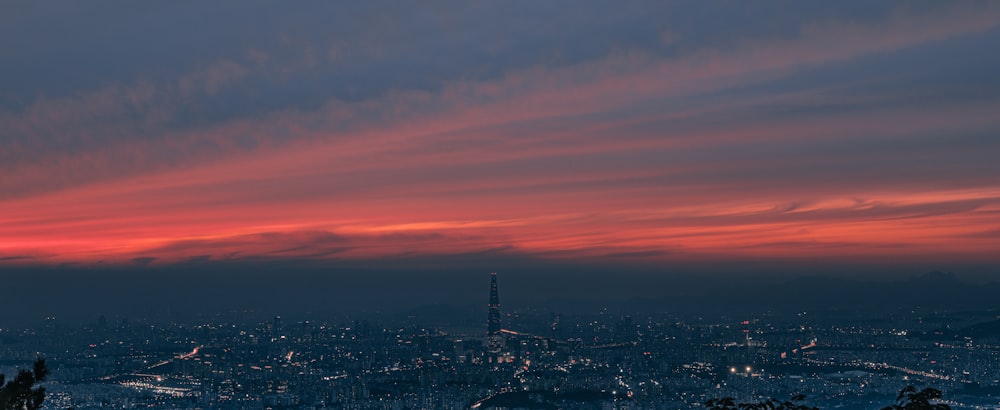 aerial photo of city buildings at night