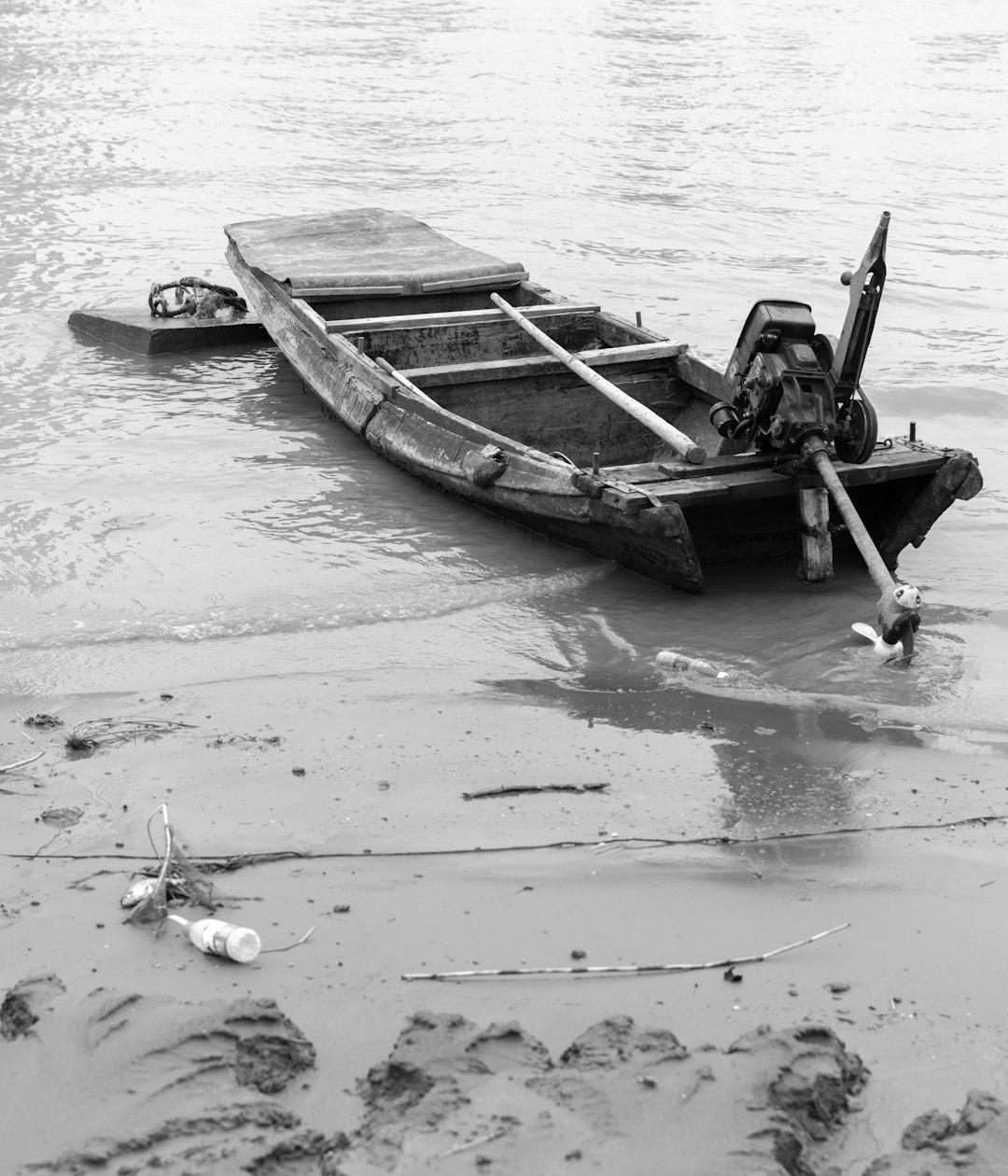 grayscale photography of speedboat on body of water