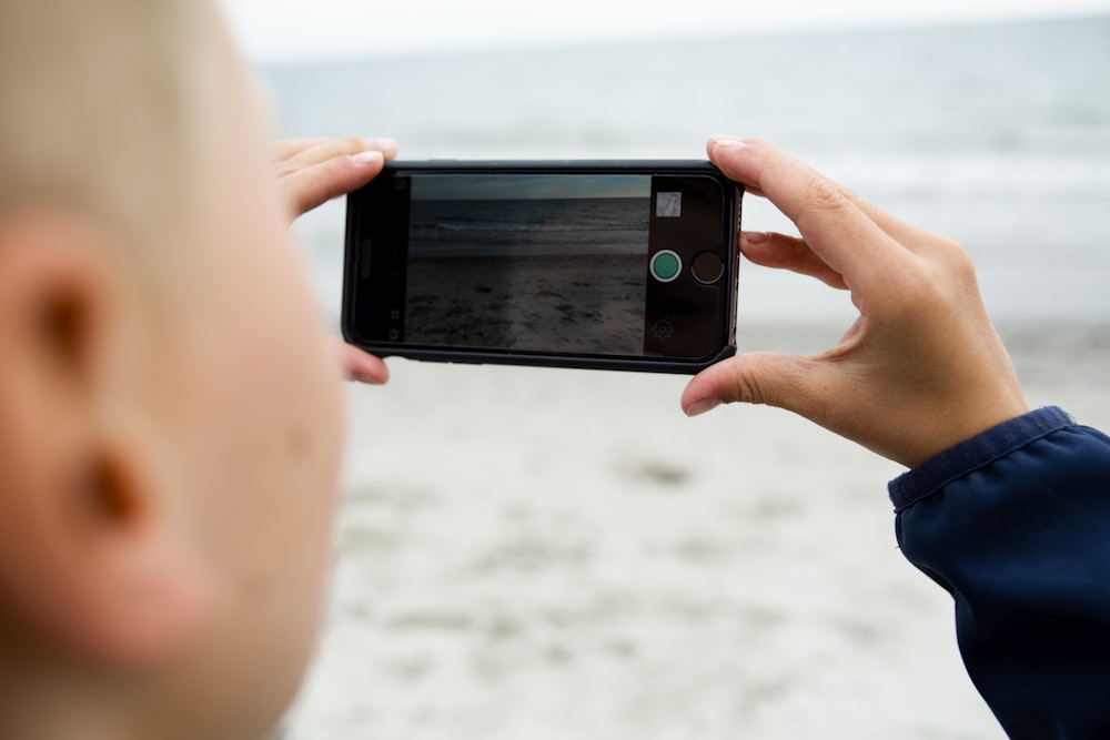 person holding smartphone