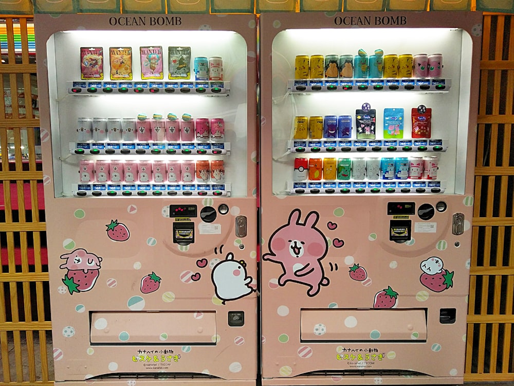 pink and white beverage vending machine