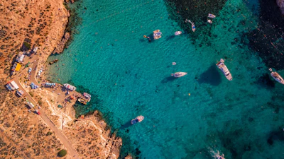 aerial view of blue sea water near island