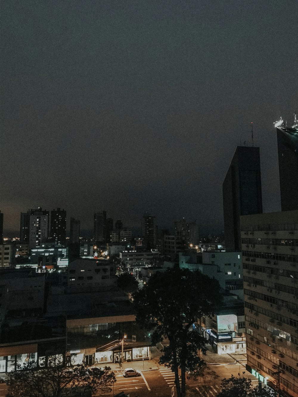 aerial photo of lighted city buildings during nighttime