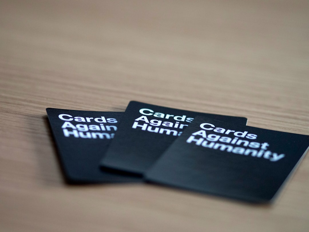 three Card Againsts Humanity cards