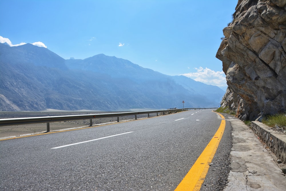 gray concrete road during daytime