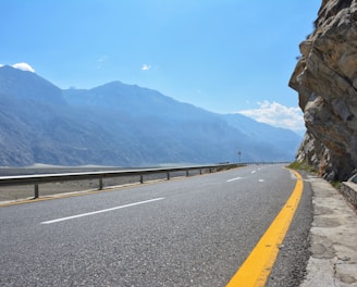 gray concrete road during daytime