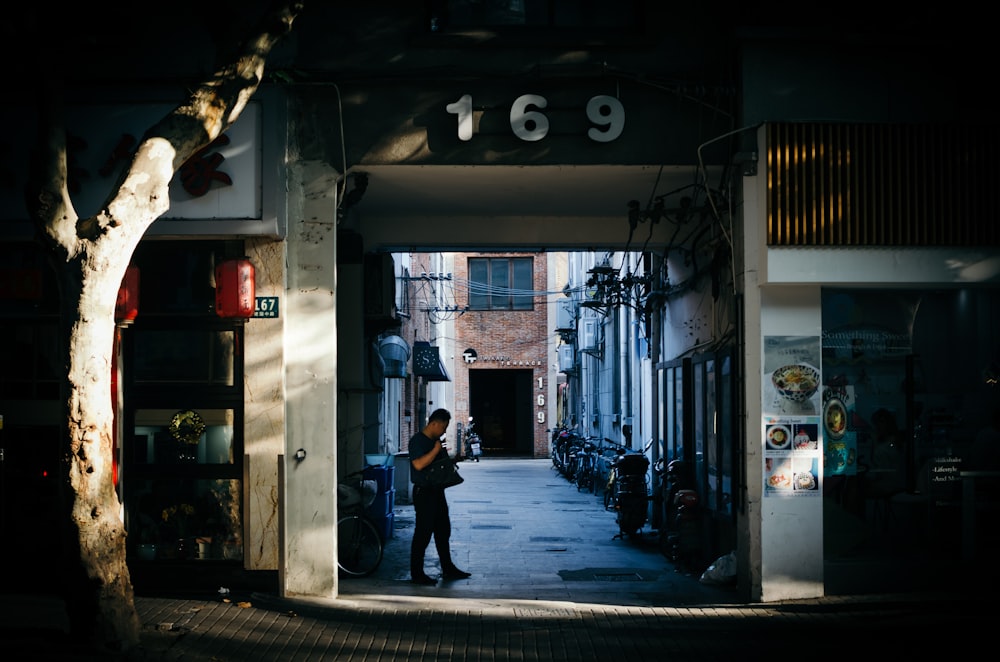 man standing near the building