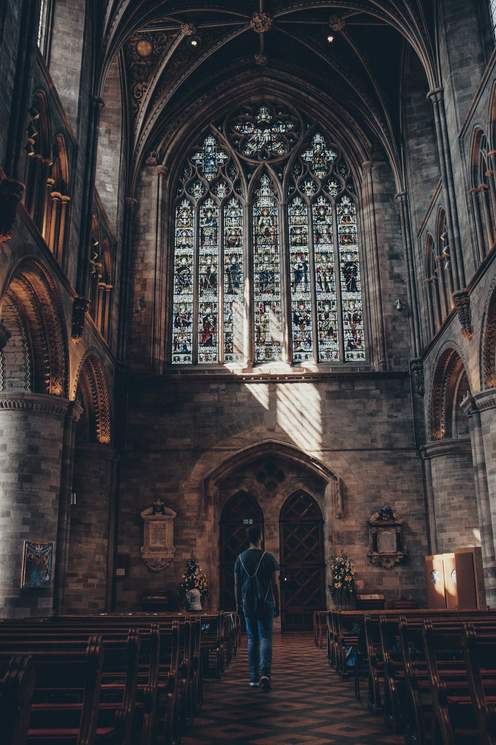 man walking inside church