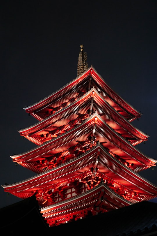 red temple during night in Sensō-ji Japan