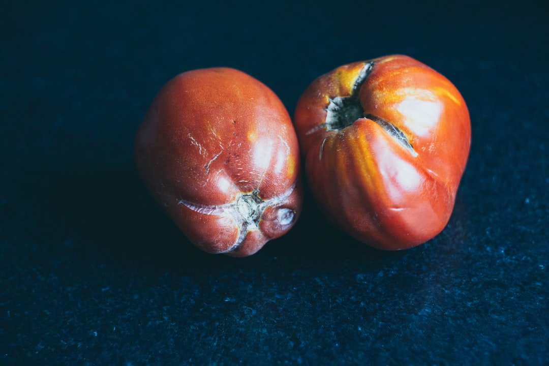 two round red fruits