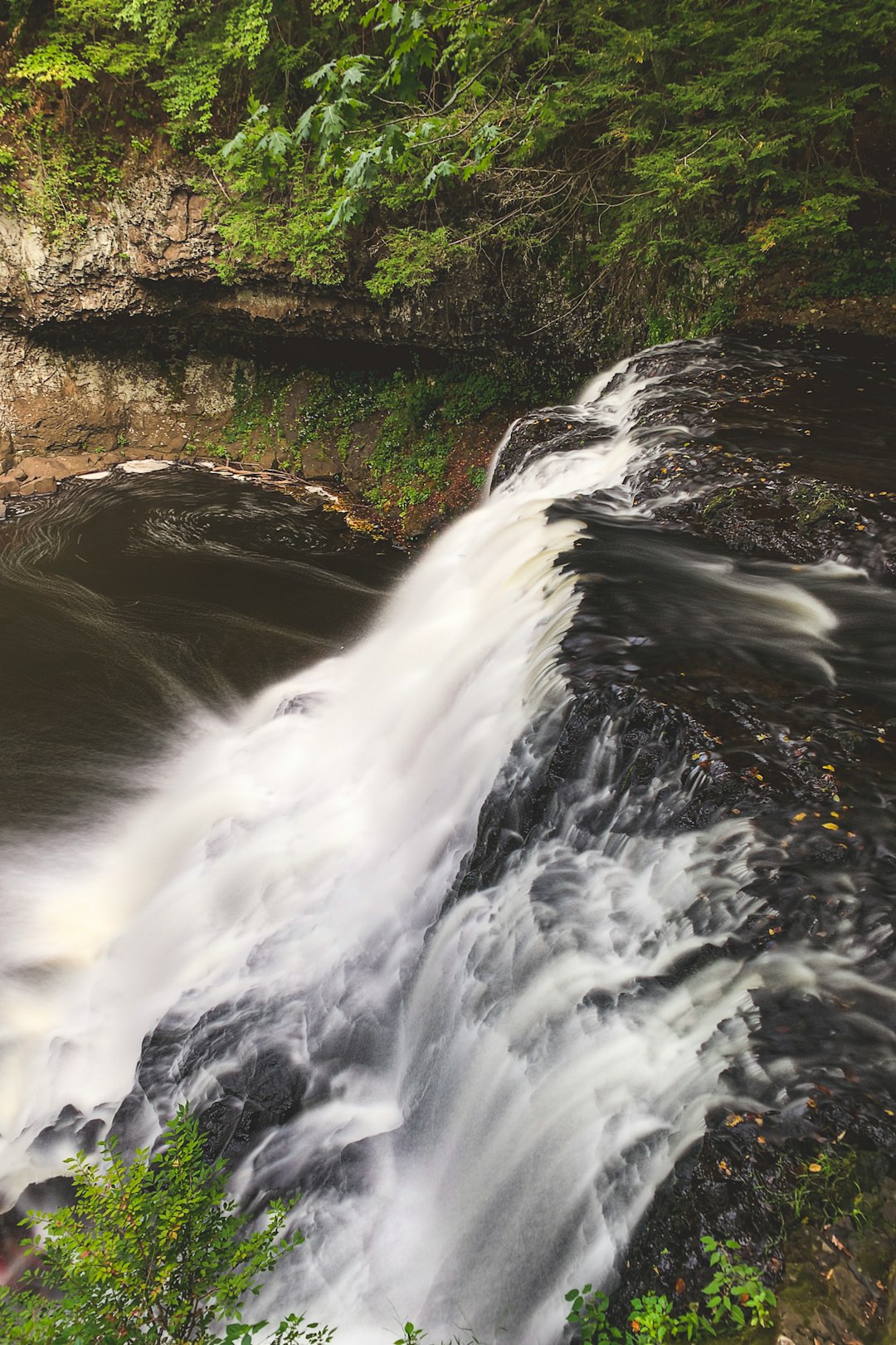 time-lapse photography of a flowing waterfall