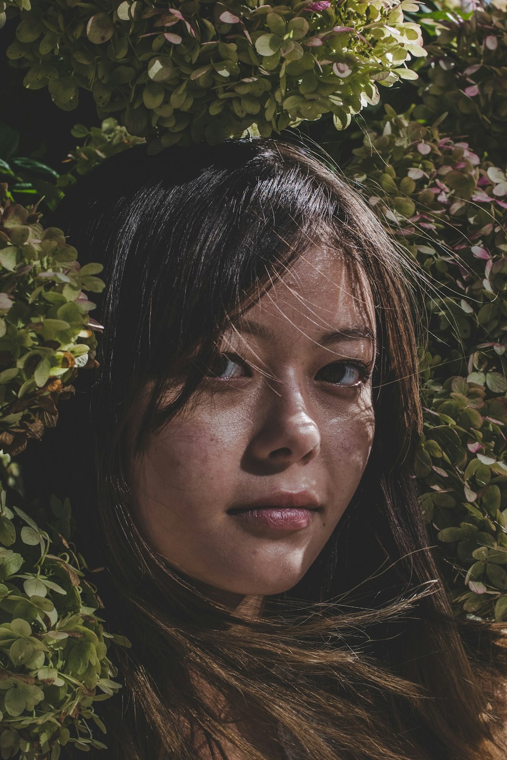 woman wears brown dress