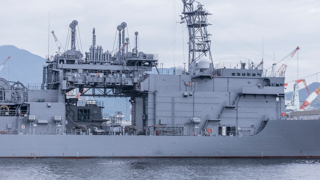 gray ship on body of water during daytime