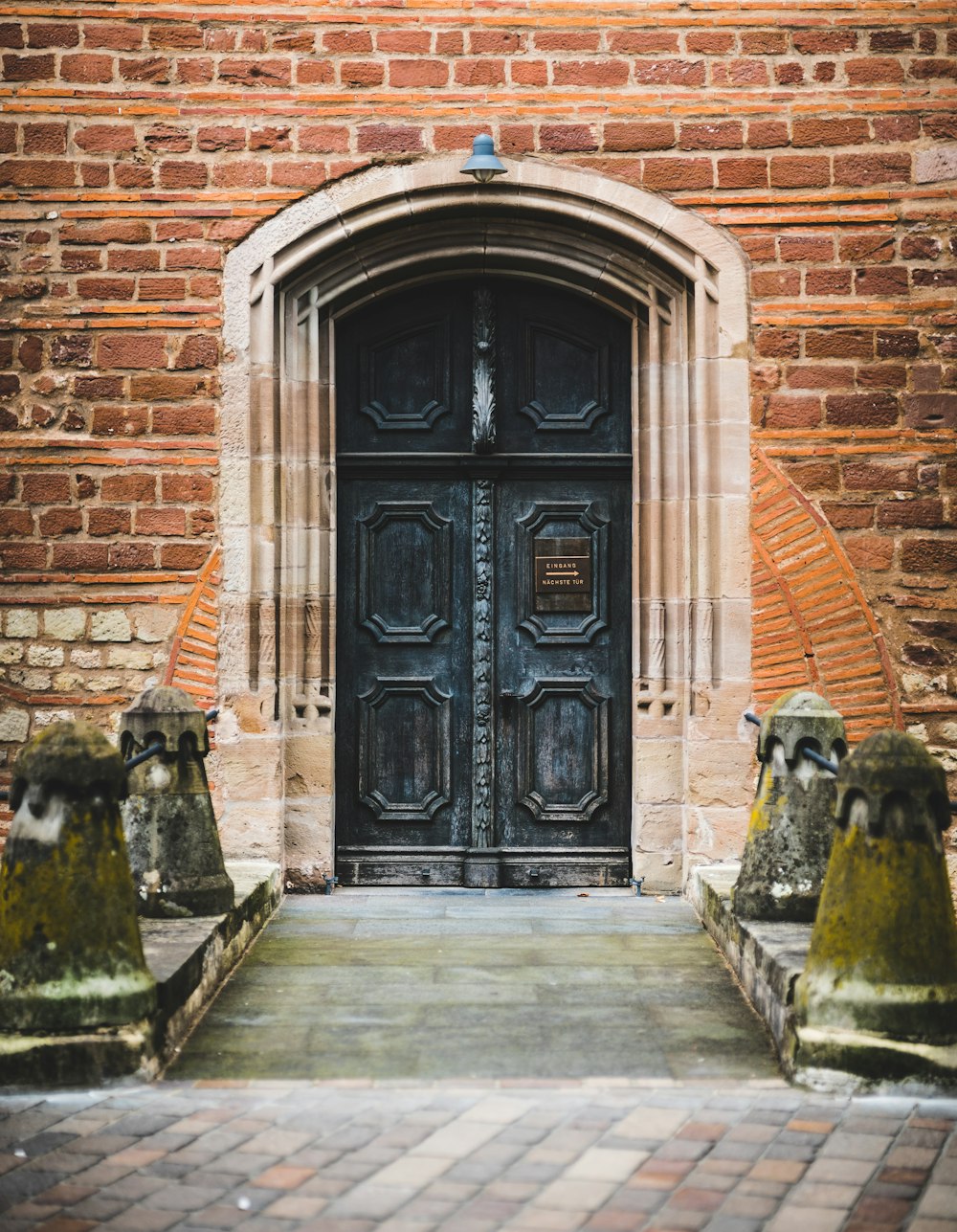 shallow focus photo of black wooden door closed