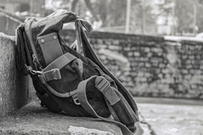 A rugged backpack packed for an outdoor adventure, showcasing durable zippers and compartments.