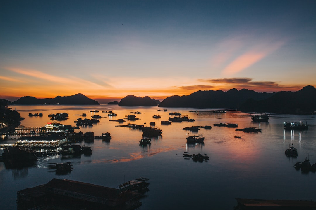 rocks on body of water, Sunset on Cat Ba Island.