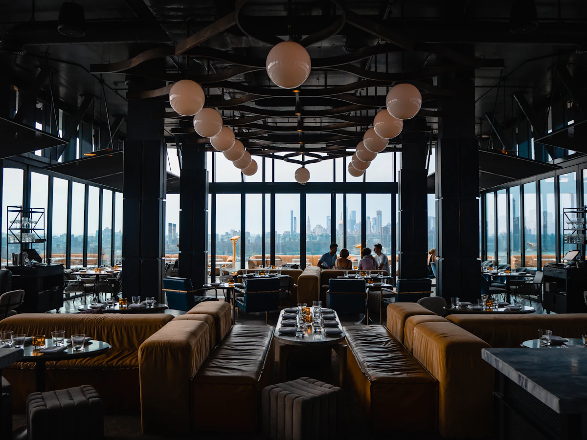 Diners seated inside a busy casual eatery
