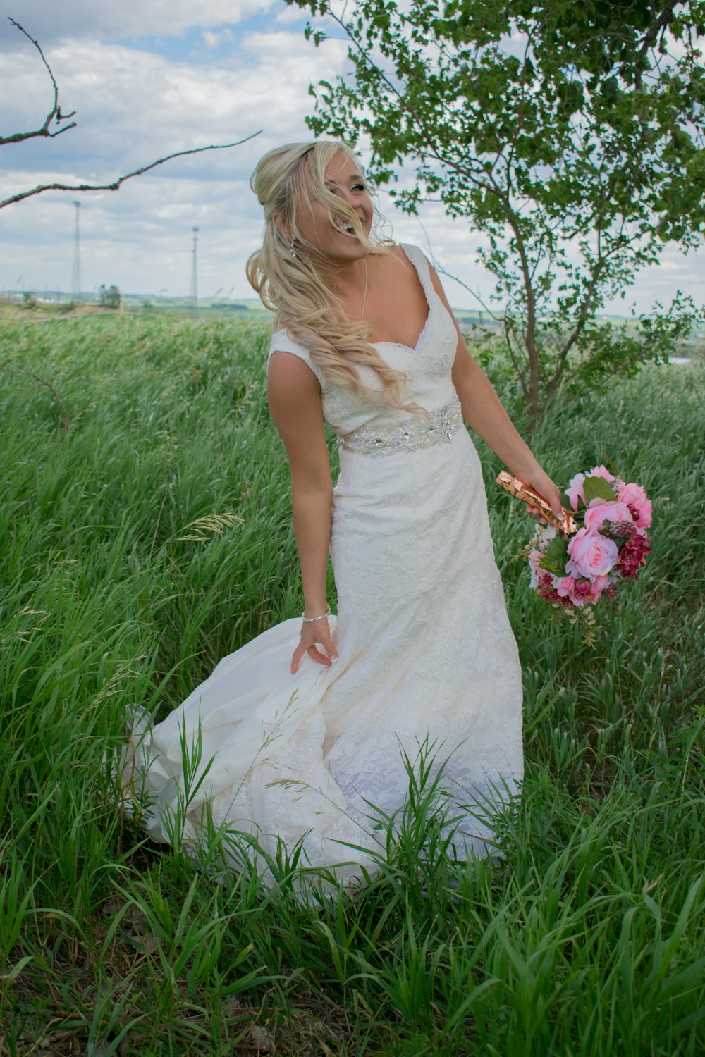 woman holding bouquet of flower