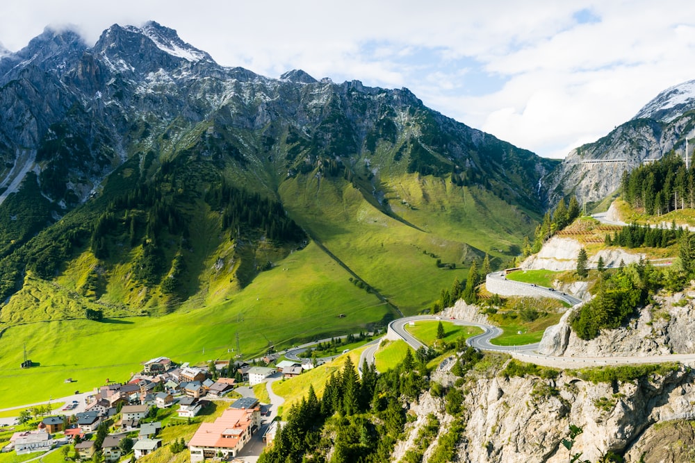 aerial view of houses near mountain during daytime