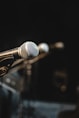 shallow focus photo of black microphone