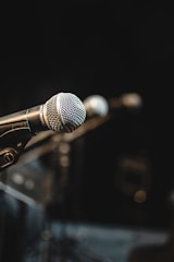 shallow focus photo of black microphone