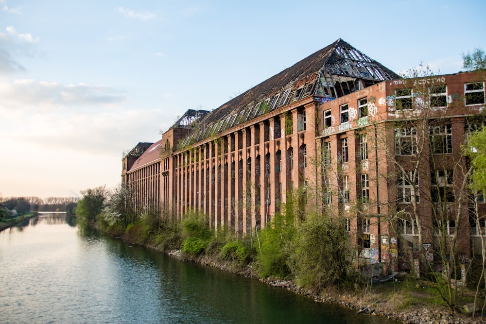 river beside brown building during daytime