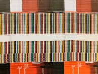 blue, red, and black striped wallpaper