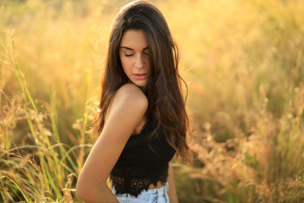 woman standing on grass field