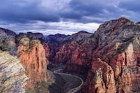 Aerial view of a winding switchback road through Zion National Park