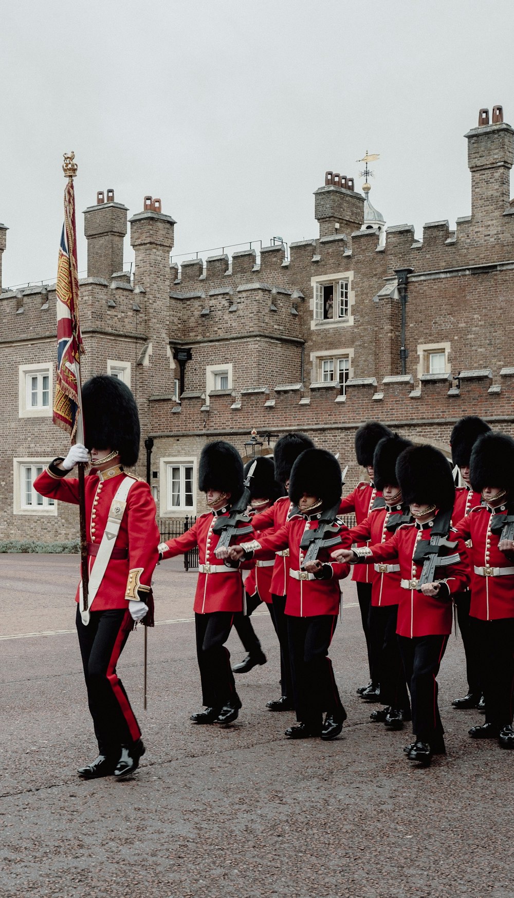 royal guards parading near building during day